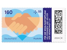 Hände die aus den Fluten retten und beim Wiederaufbau gemeinsam anpacken