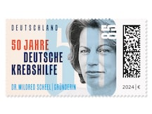 Schriftzug des Briefmarkenthemas mit Porträtfoto Gründerin Dr. Mildred Scheel