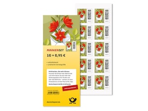 Geffneter Brief, aus dem Blumen ranken