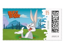Bugs Bunny schaut aus einem Erdloch heraus