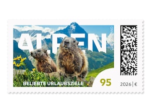 Murmeltiere vor dem Bergpanorama der Jungfrau Region